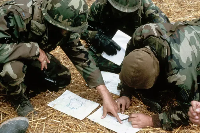 Framed Print : Combat Soldiers Looking at Maps Framed Print : Combat Soldiers Looking at Maps