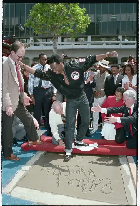 Framed Print : Comedian Eddie Murphy Being Printed at Mann's Chinese Theater Framed Print : Comedian Eddie Murphy Being Printed at Mann's Chinese Theater