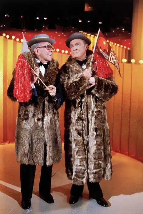 : Comedians Bob Hope and George Burns on Stage in Fur Coats : Comedians Bob Hope and George Burns on Stage in Fur Coats