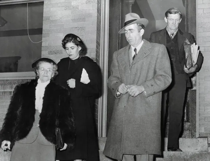 Framed Print : Communist Family Leaving Court Framed Print : Communist Family Leaving Court