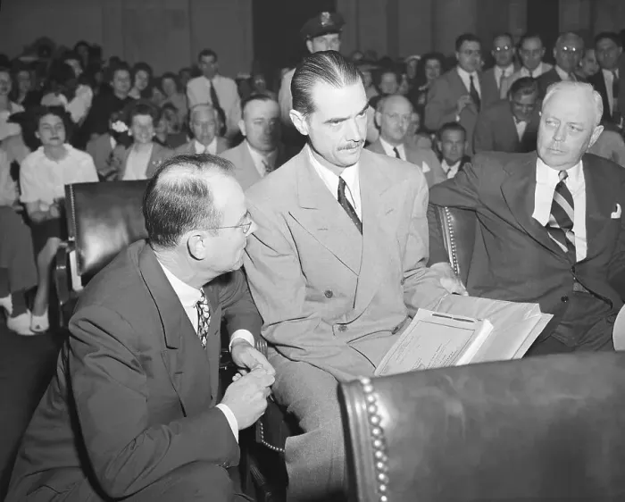 Framed Print : Company Executives Confer with Howard Hughes Framed Print : Company Executives Confer with Howard Hughes
