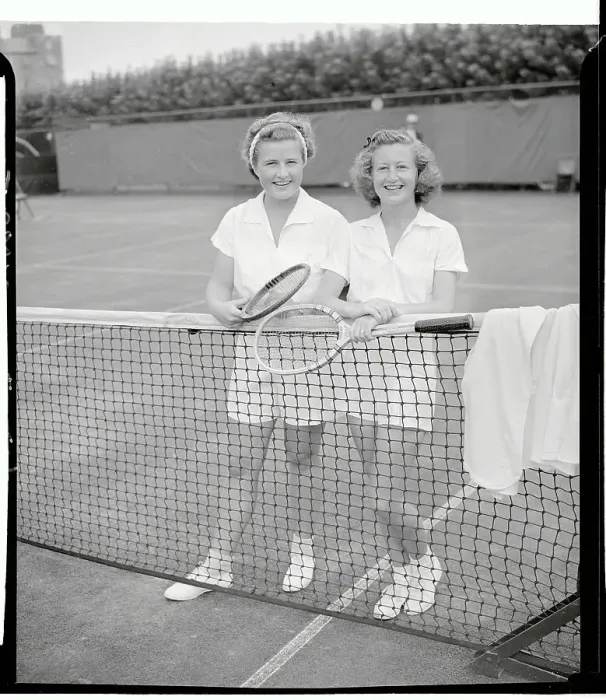Framed Print : Competing Women Tennis Players Standing by Net