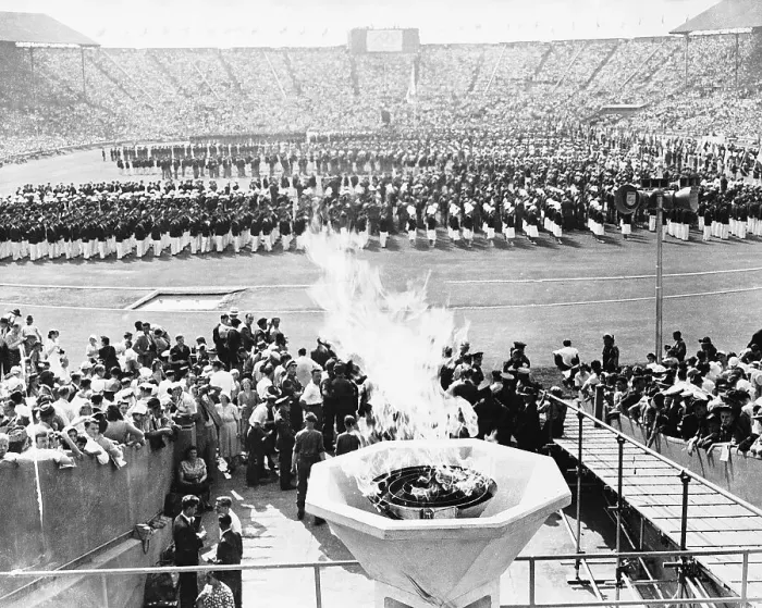 Framed Print : Competitors with Olympic Flame Framed Print : Competitors with Olympic Flame
