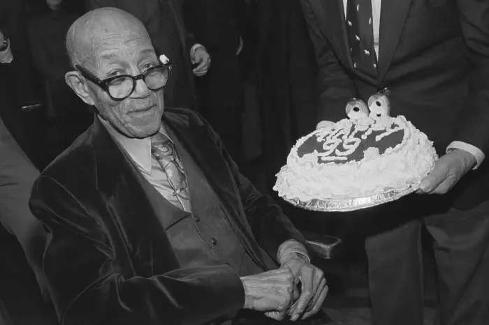Framed Print : Composer Eubie Blake with Birthday Cake Framed Print : Composer Eubie Blake with Birthday Cake