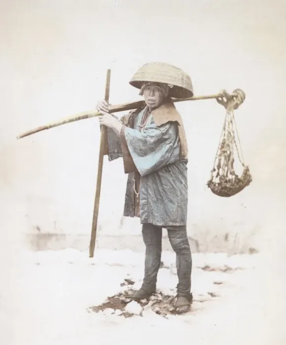 Framed Print : Coolie. A Japanese coolie or unskilled labourer carrying a rod of bamboo, circa 1865 Framed Print : Coolie. A Japanese coolie or unskilled labourer carrying a rod of bamboo, circa 1865