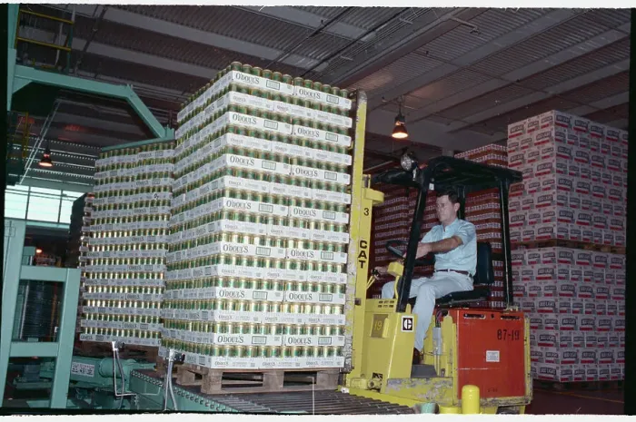 Framed Print : Corbett Caldwell Stacking Beer in Brewery Framed Print : Corbett Caldwell Stacking Beer in Brewery
