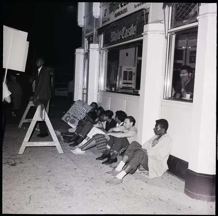 Framed Print : CORE Demonstrators Sit Outside Restaurant Framed Print : CORE Demonstrators Sit Outside Restaurant