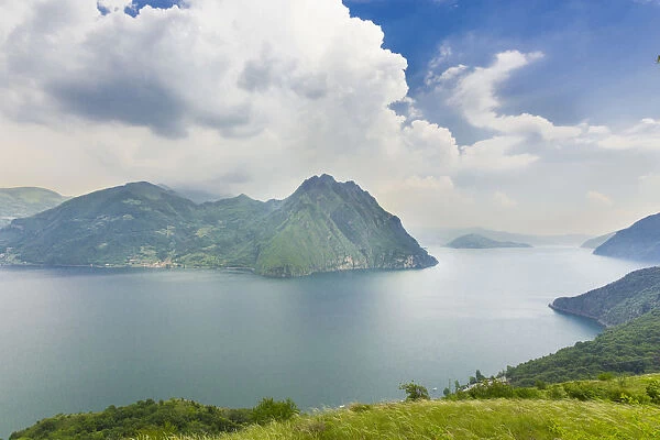 Corna Trentapassi, 1248m, and Monte Isola island in Lake Iseo or Lago d Iseo, Castro, Bergamo, Italy