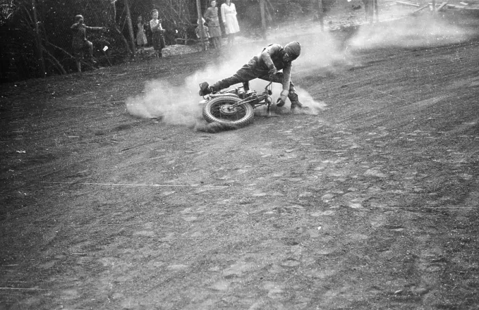 Framed Print : Cornering. 13th October 1945: An army dispatch rider coming off his motorcycle