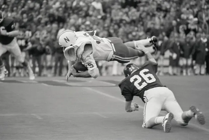 Framed Print : Cornhusker Running Back Gets Tripped Up By Sooners Tackler Framed Print : Cornhusker Running Back Gets Tripped Up By Sooners Tackler