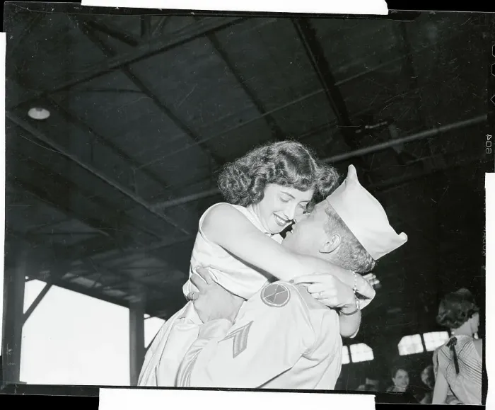 Framed Print : Corporal Howard Ross Hugging His Wife