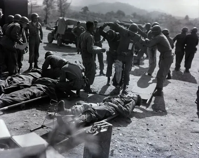 Framed Print : Corpsmen Work On Wounded