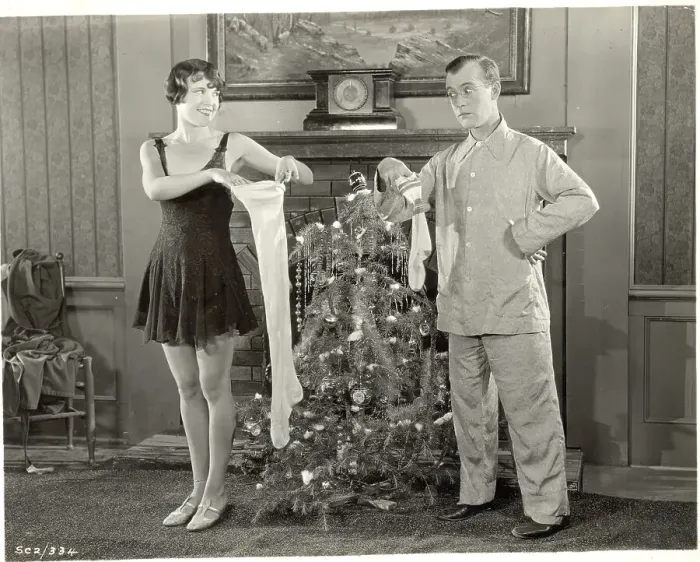 Framed Print : A Couple Compares Christmas Stockings Framed Print : A Couple Compares Christmas Stockings