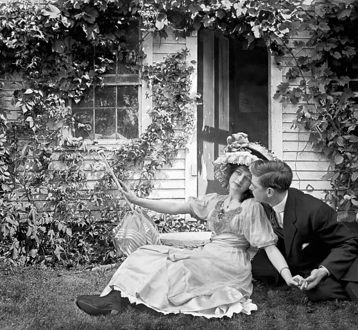 Framed Print : Couple Courting on Lawn of Ivy Covered House Framed Print : Couple Courting on Lawn of Ivy Covered House