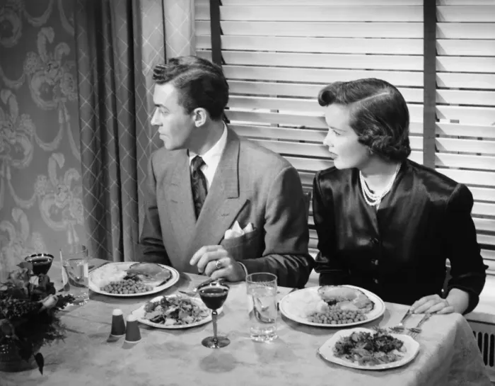 Framed Print : Couple eating dinner (B&W), elevated view Framed Print : Couple eating dinner (B&W), elevated view