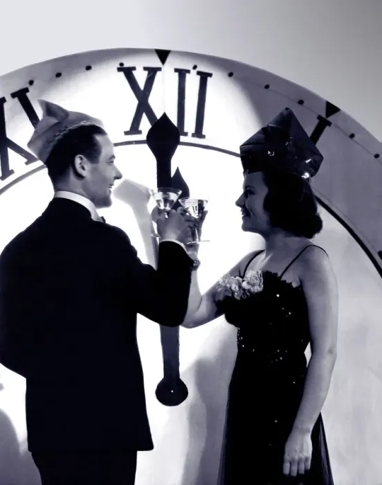 Framed Print : Couple in formal wear celebrating New Year (B&W) Framed Print : Couple in formal wear celebrating New Year (B&W)