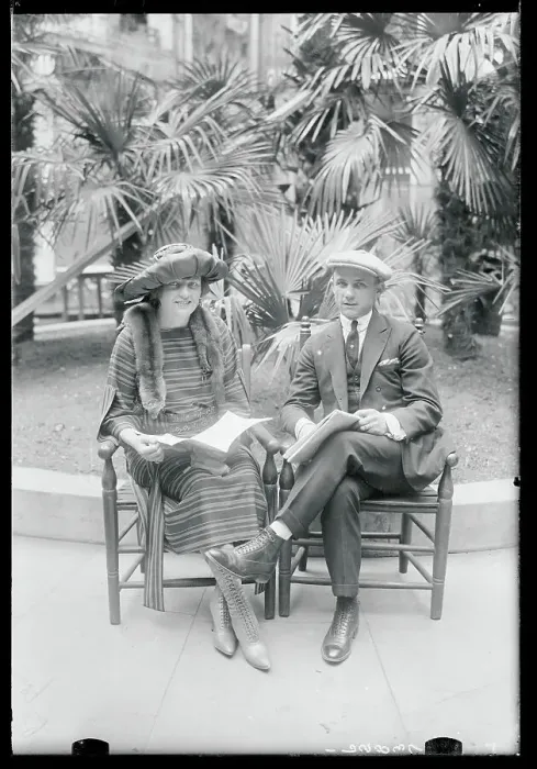 Framed Print : Couple During Giants Gathering Posing in Chairs Framed Print : Couple During Giants Gathering Posing in Chairs