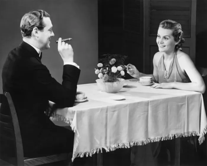 Framed Print : Couple having coffee at table (B&W) Framed Print : Couple having coffee at table (B&W)