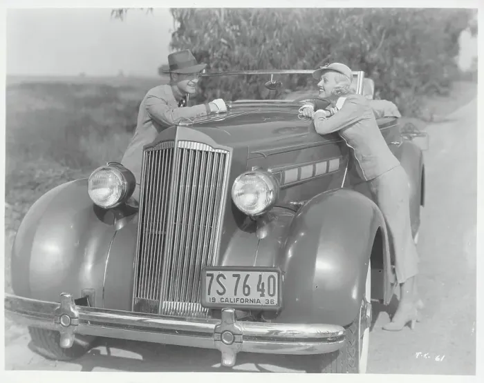 Framed Print : Couple Leaning on Automobile Framed Print : Couple Leaning on Automobile