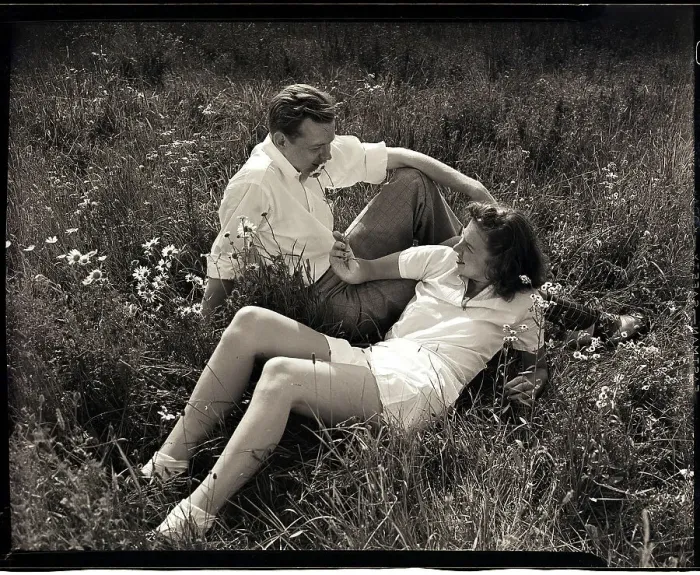 Framed Print : Couple Lying in Field Framed Print : Couple Lying in Field