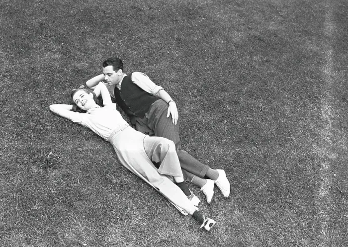 Framed Print : Couple lying on grass, (B&W), elevated view Framed Print : Couple lying on grass, (B&W), elevated view
