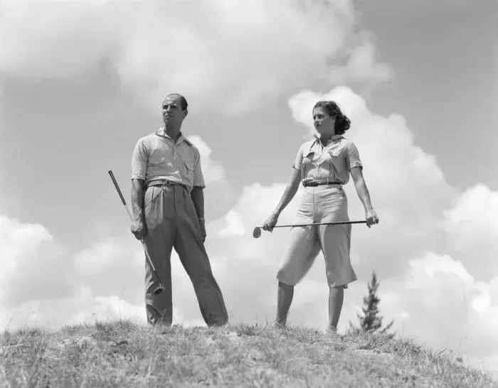 Framed Print : Couple playing golf