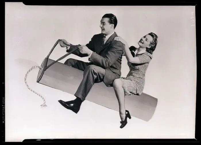 Framed Print : Couple Riding Fake Stick Of Dynamaite Framed Print : Couple Riding Fake Stick Of Dynamaite