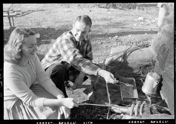 Framed Print : Couple Roasting Hot Dogs on Flame Stove Framed Print : Couple Roasting Hot Dogs on Flame Stove