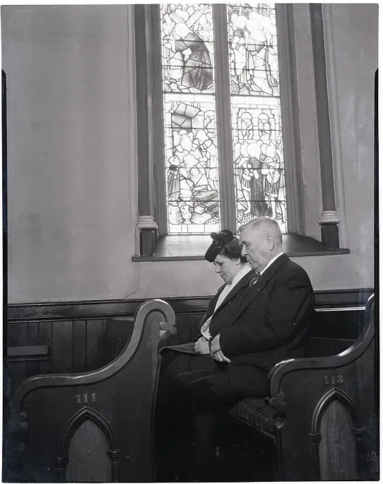 Framed Print : Couple Seated in Church Pew