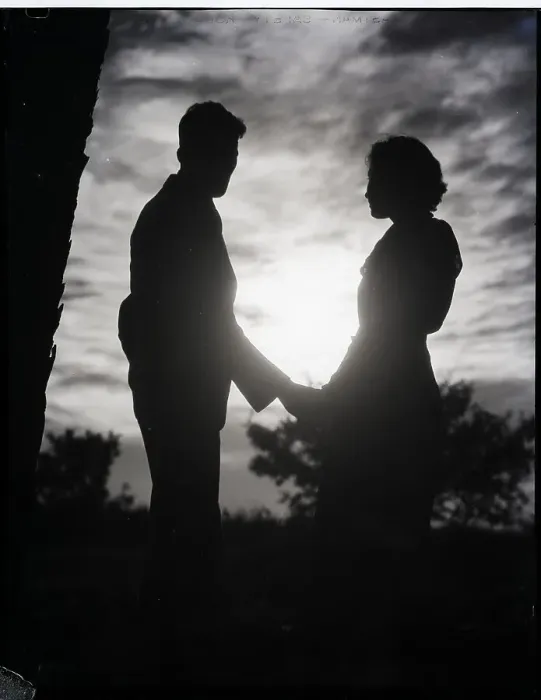 Framed Print : Couple Silhouetted In Sunset Holds Hands Framed Print : Couple Silhouetted In Sunset Holds Hands