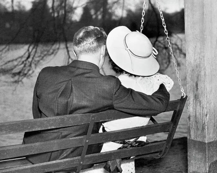 Framed Print : Couple Sitting Together on a Swing Framed Print : Couple Sitting Together on a Swing
