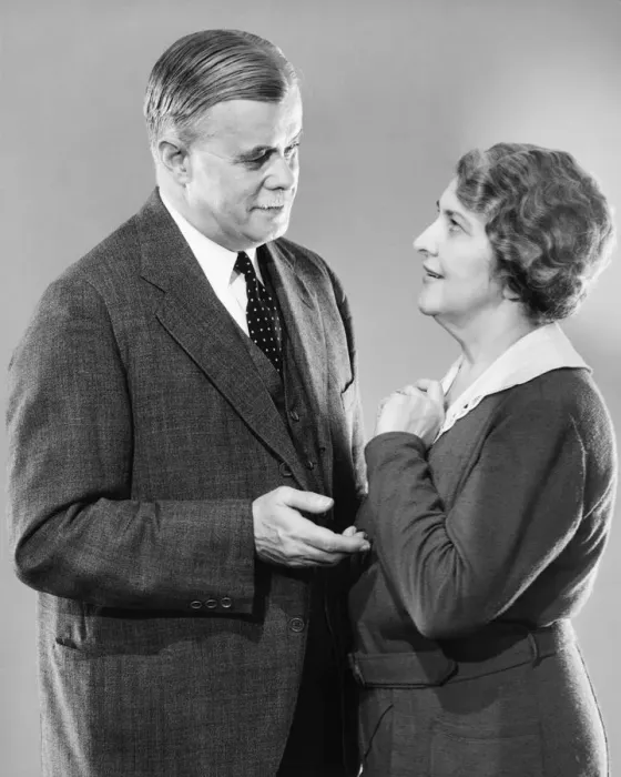 Framed Print : Couple standing face to face, talking, (B&W) Framed Print : Couple standing face to face, talking, (B&W)