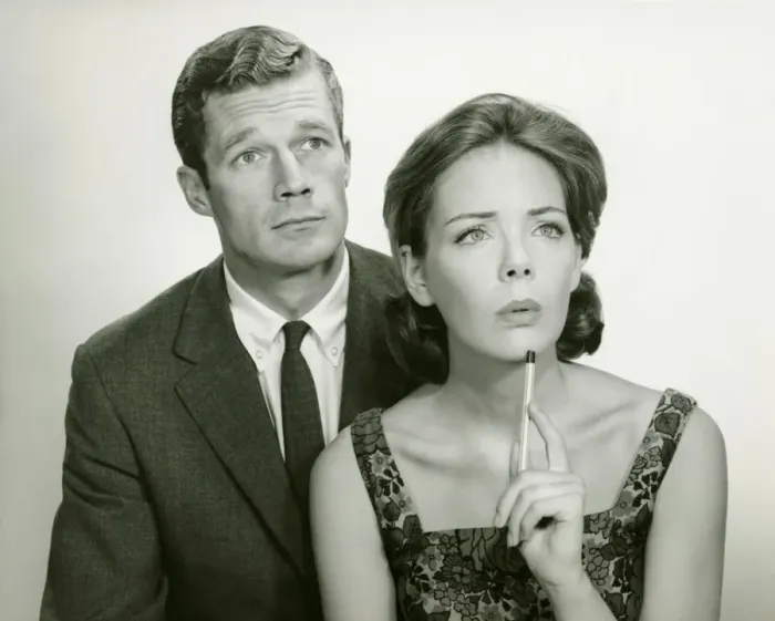 Framed Print : Couple in studio, looking thoughtful, posing (B&W), portrait Framed Print : Couple in studio, looking thoughtful, posing (B&W), portrait