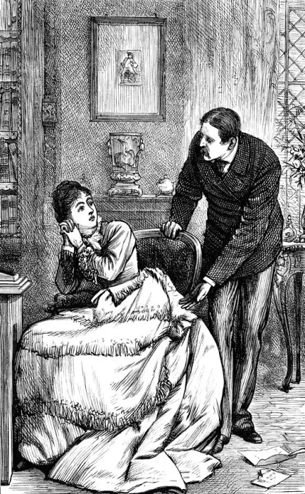 Framed Print : Couple talking about a letter lying on floor Framed Print : Couple talking about a letter lying on floor