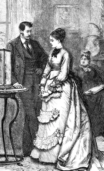 Framed Print : Couple talking at a round table in living room Framed Print : Couple talking at a round table in living room