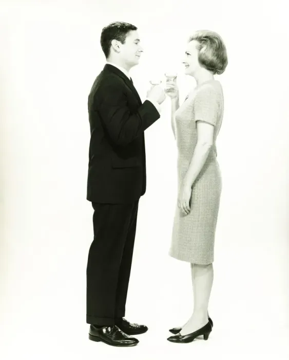 Framed Print : Couple toasting in studio, (B&W)