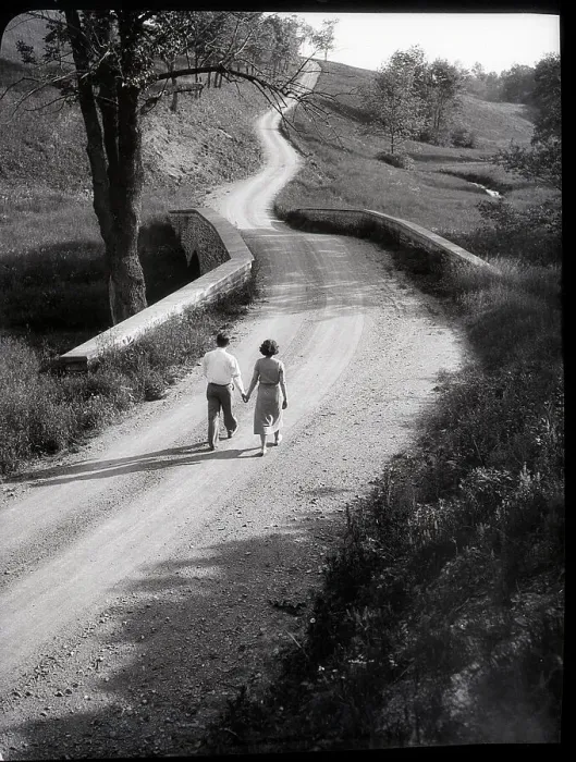 Framed Print : Couple Walking Along Rural Road Framed Print : Couple Walking Along Rural Road