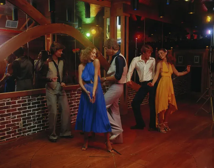 Framed Print : Couples dancing together at nightclub, smiling Framed Print : Couples dancing together at nightclub, smiling