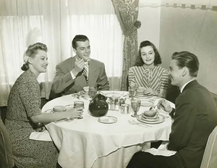 Framed Print : Two couples having dinner, (B&W)