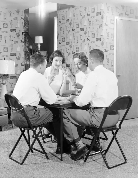 Framed Print : Two couples playing bridge around card table. (Photo by H