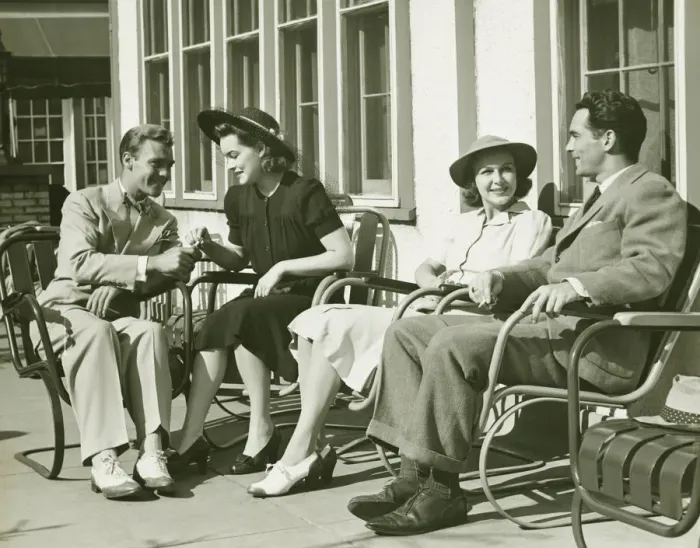 Framed Print : Two couples relaxing outside, (B&W) Framed Print : Two couples relaxing outside, (B&W)