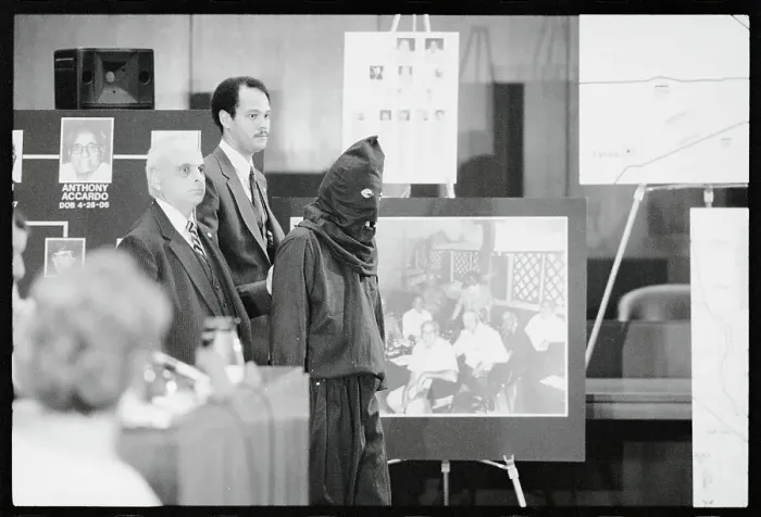 Framed Print : Covered Witness Testifying in Court Framed Print : Covered Witness Testifying in Court