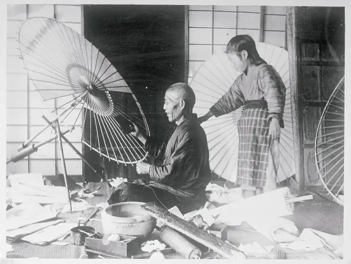 Framed Print : Craftsman Making a Parasol Framed Print : Craftsman Making a Parasol