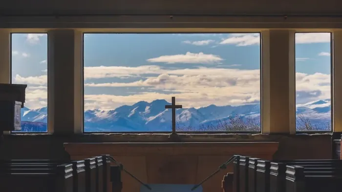 Framed Print : A cross inside Church with Mountain background
