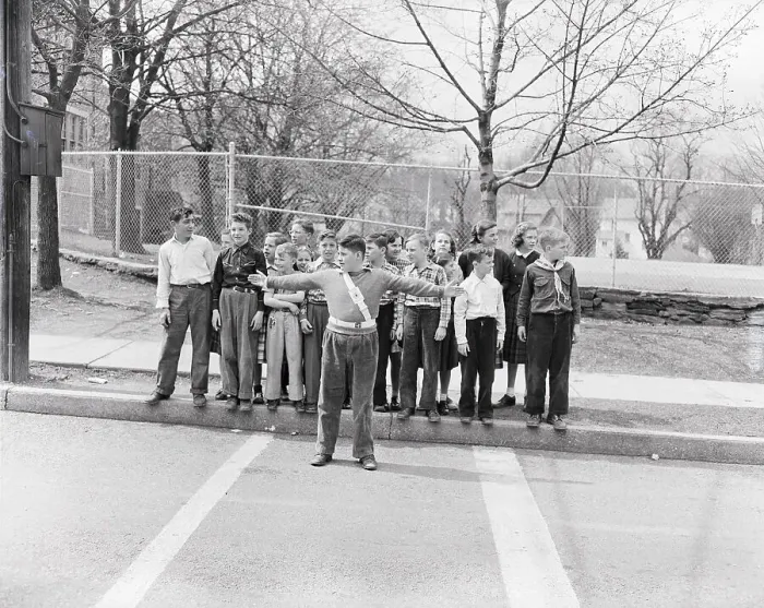 Framed Print : Crossing Guard Assisting Students Framed Print : Crossing Guard Assisting Students