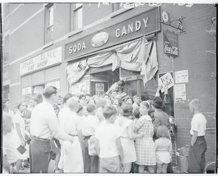 Framed Print : Crowd Gathering Outside of a Stationary Store Framed Print : Crowd Gathering Outside of a Stationary Store