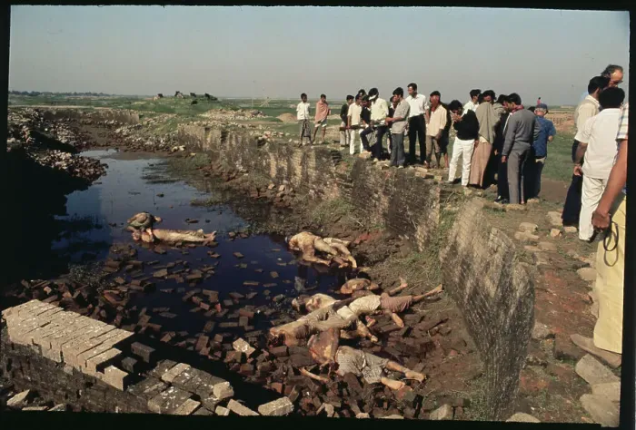 Framed Print : Crowd Gazing into Muddy Basin with Strewn Bodies Framed Print : Crowd Gazing into Muddy Basin with Strewn Bodies