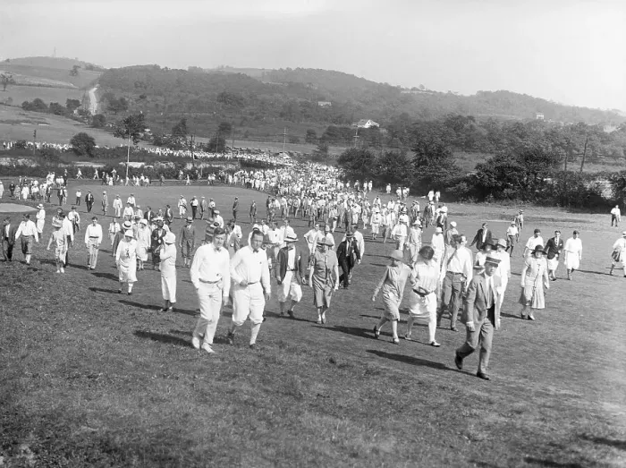 Framed Print : Crowd in Long Line Walking Over Golfcourse Framed Print : Crowd in Long Line Walking Over Golfcourse