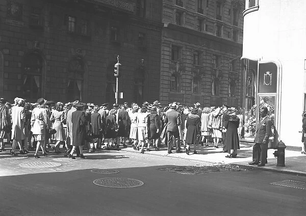 Crowd of people crossing street, (B&W)