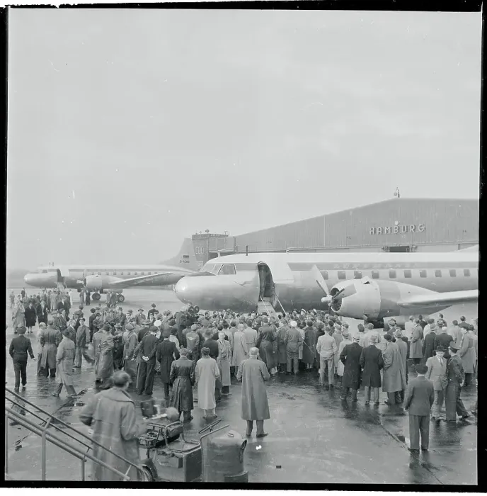 Framed Print : Crowd Standing by Airplane Framed Print : Crowd Standing by Airplane